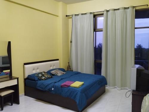 Postel nebo postele na pokoji v ubytování Klebang Condominium Melaka