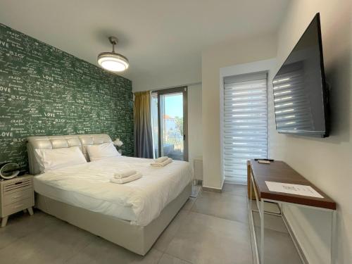 Luxury Apartment Port of Jaffaにあるベッド