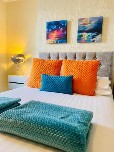 Ένα ή περισσότερα κρεβάτια σε δωμάτιο στο Cwtch Guesthouse