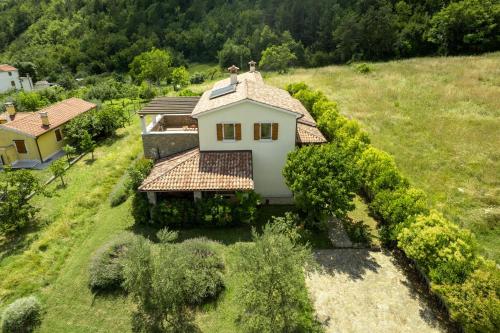 an aerial view of a house on a hill at Villa Dol an ideal spa and wellness escape in Istria in Buzet