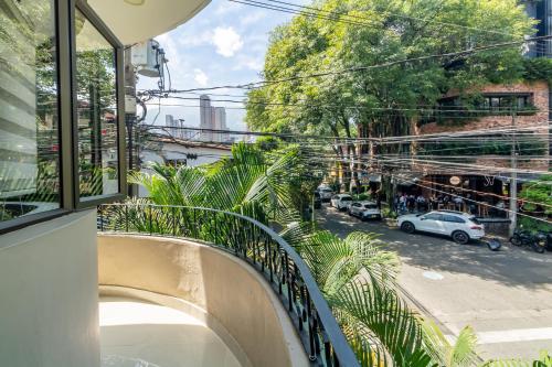 a balcony with a view of a street at CASA TURISTICA MACHU PICCHU MEDELLIN in Medellín