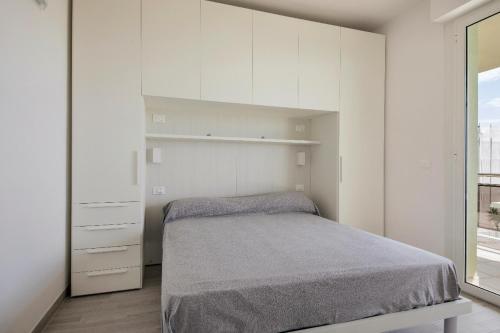 Residence Brezza di Mareにあるベッド