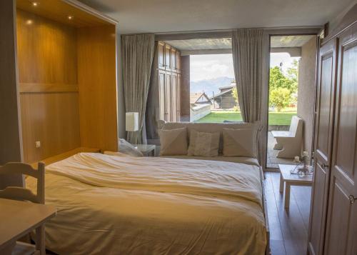 Postel nebo postele na pokoji v ubytování Appartements dans la Résidence Panorama
