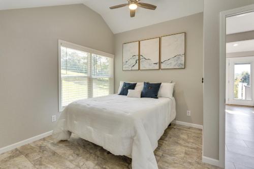 a bedroom with a bed and a ceiling fan at Young Harris Vacation Rental with Mountain Views! in Young Harris
