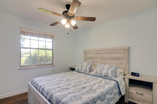 a bedroom with a bed with a ceiling fan at Picturesque Page Home Near Lake Powell and Hiking! in Page
