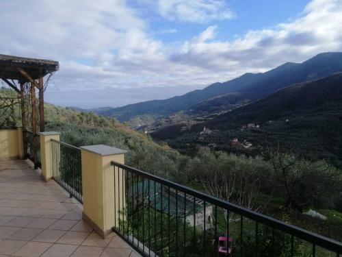 a balcony with a view of a mountain at Sweet Caselle 2 in Testico