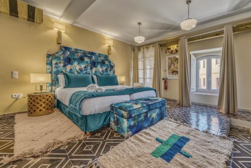 מיטה או מיטות בחדר ב-Casa Riad Yasmin