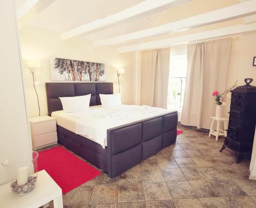 Postel nebo postele na pokoji v ubytování Ferienbungalow Kastanie