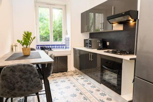 Photo de la galerie de l'établissement Appartement Cosy avec jardin, à Mulhouse