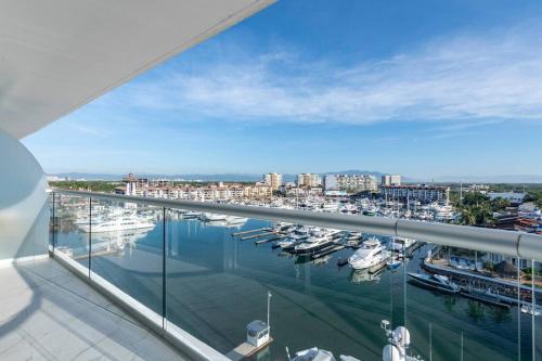 a view of a marina with boats in the water at Luxury Condo On The Marina in Puerto Vallarta