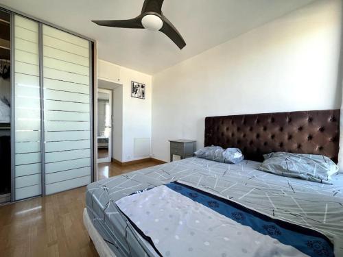 Postel nebo postele na pokoji v ubytování Duplex : dernier étage avec balcon
