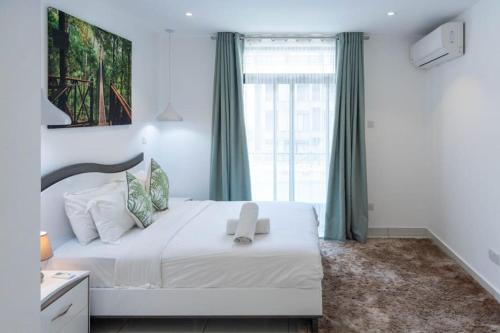 Postel nebo postele na pokoji v ubytování Exec 2 Bed @ Embassy Gardens