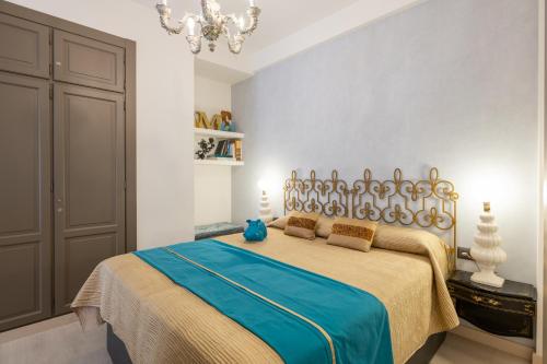 Ένα ή περισσότερα κρεβάτια σε δωμάτιο στο Don Juan de Málaga 2 La Catedral