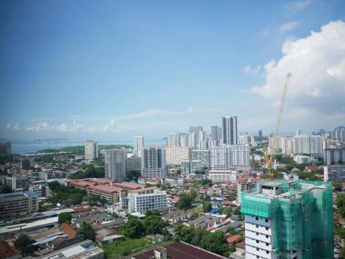 a view of a city with tall buildings at Beacon Executive Suite by Uptrend Home Management in George Town