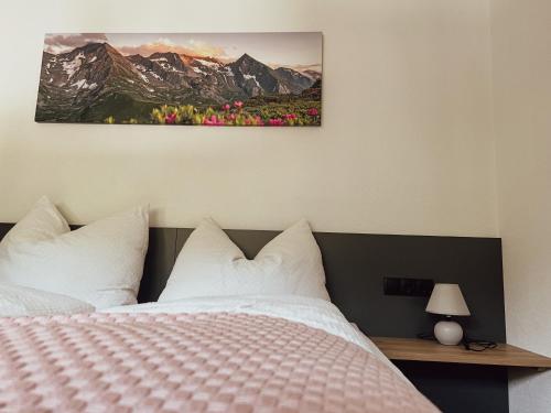 Postel nebo postele na pokoji v ubytování Apartment Goldene Mitte