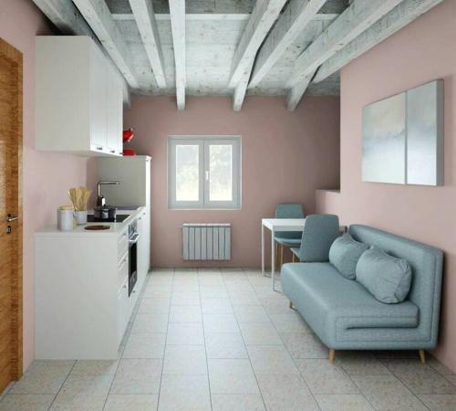 Una cocina o zona de cocina en Pink cozy home