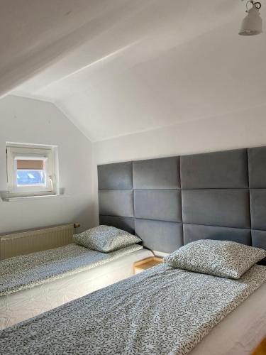 Ένα ή περισσότερα κρεβάτια σε δωμάτιο στο Apartment Storczykowa Airport