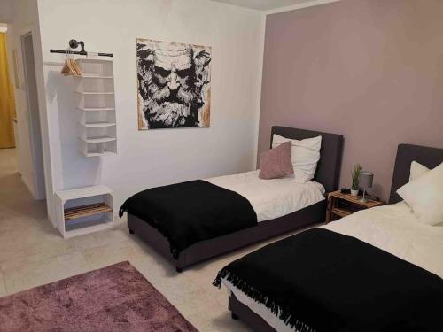 Letto o letti in una camera di RheinMosel Glück 9