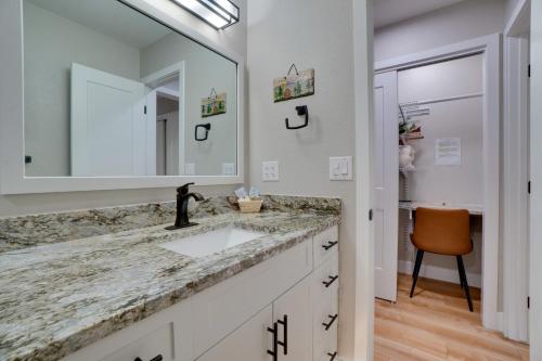 a bathroom with a sink and a mirror at Estes Park Vacation Rental 1 Mi to National Park in Estes Park