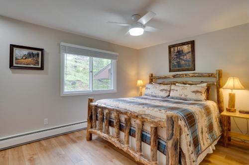 a bedroom with a bed and a window at Estes Park Vacation Rental 1 Mi to National Park in Estes Park