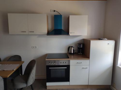 Køkken eller tekøkken på estrella24 LIVING ROOMS Kairo