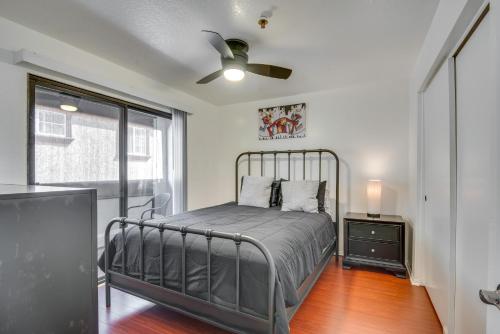 a bedroom with a bed and a ceiling fan at Modern Hawthorne Apartment Near SoFi Stadium in Hawthorne