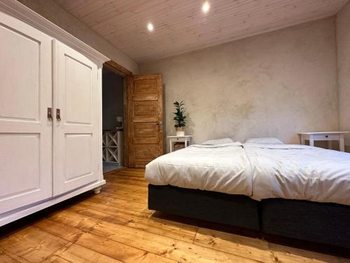 Ένα ή περισσότερα κρεβάτια σε δωμάτιο στο Magical two bedroom apartment in Viljandi