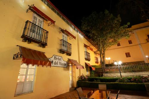 a building with a sign that reads hotel all night at Hotel Real Del Monte in Mineral del Monte