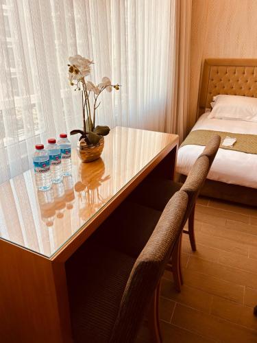 Postel nebo postele na pokoji v ubytování Lily Rooms