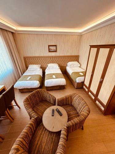 Postel nebo postele na pokoji v ubytování Lily Rooms