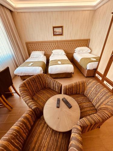 Postel nebo postele na pokoji v ubytování Lily Rooms