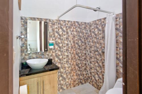 Koupelna v ubytování Casa Blanca San Antonio Hostal Boutique
