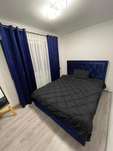 Krevet ili kreveti u jedinici u objektu Apartament ultramodern central