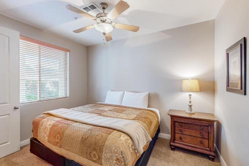 a bedroom with a bed and a ceiling fan at Las Palmas Leisure in St. George