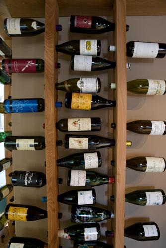 a wall of wine bottles in a wine cellar at Damaranto Residenza e Cucina in Soave