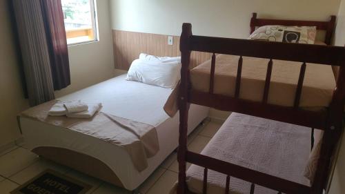 Ένα ή περισσότερα κρεβάτια σε δωμάτιο στο Hotel Goedert