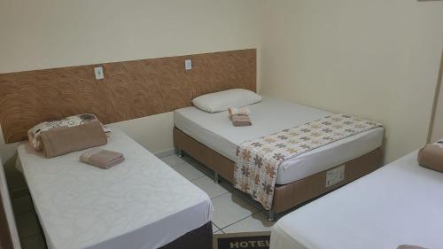Ένα ή περισσότερα κρεβάτια σε δωμάτιο στο Hotel Goedert