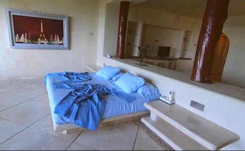 A bed or beds in a room at Casa cielo