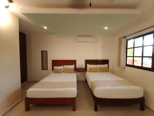 Hotel Beach Don Gonzaloにあるベッド