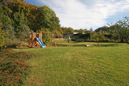 a park with a playground and a slide at Residenz Binz - FeWo 16 in Binz