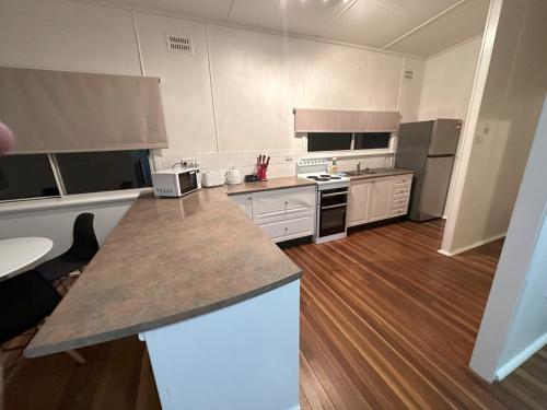 a kitchen with a counter top in a room at Private 1 Bedroom Apartment with Fenced Yard in Grafton