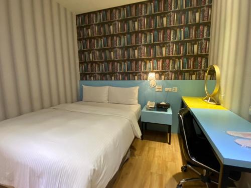 Postel nebo postele na pokoji v ubytování 191 Hotel