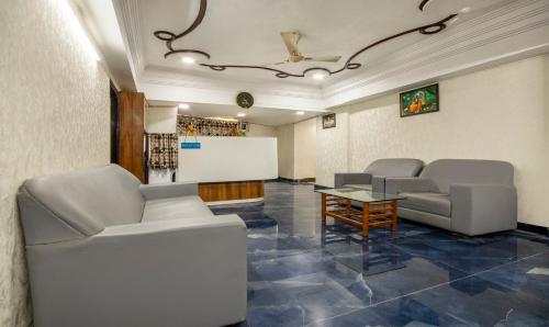 Posezení v ubytování Itsy Hotels Shree Krishna Palace