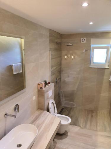 Un baño de Villa Aida