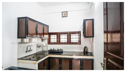 Dapur atau dapur kecil di Noel Apartments