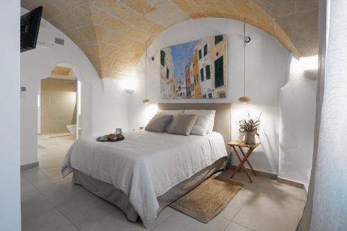 Кровать или кровати в номере Hotel Nou Sant Antoni