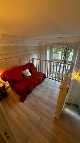 En eller flere senge i et værelse på Le Sarciron 10 Duplex Le Mont Dore