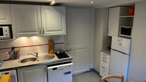 Køkken eller tekøkken på Le Sarciron 10 Duplex Le Mont Dore