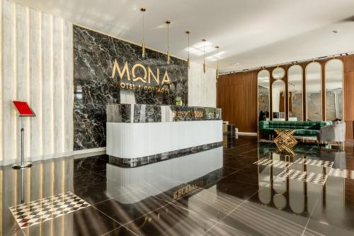 Lobbyen eller receptionen på Mona Hotel and Cottages