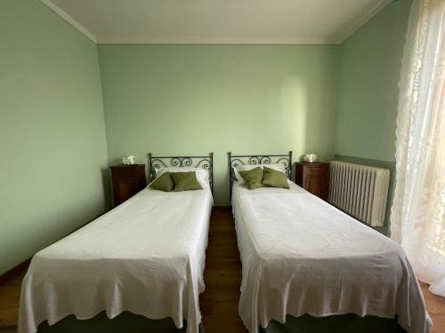 Katil atau katil-katil dalam bilik di Agriturismo SetteLune